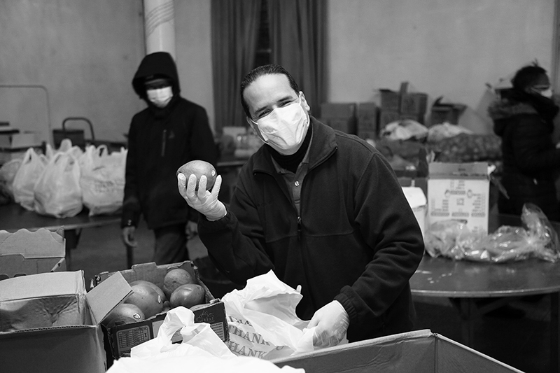 2020 : Food Lines : Seventh Day Adventists Help the Needy : Streetlife : New York City : Times Square : Richard Moore : Photographer : Photojournalist